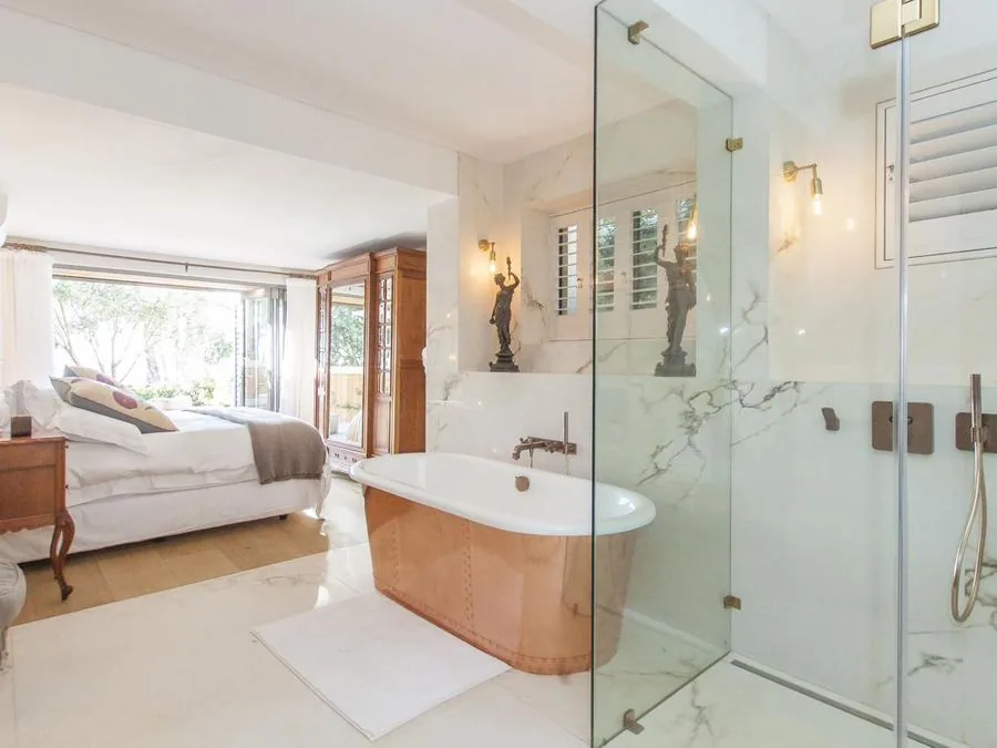 Main bedroom with a freestanding copper bath, Constantia and Southern Suburbs