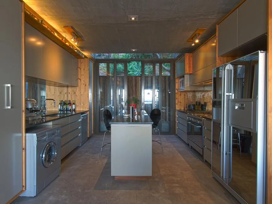 Galley kitchen with timber and steel finishes, Sea Point and Bantry Bay